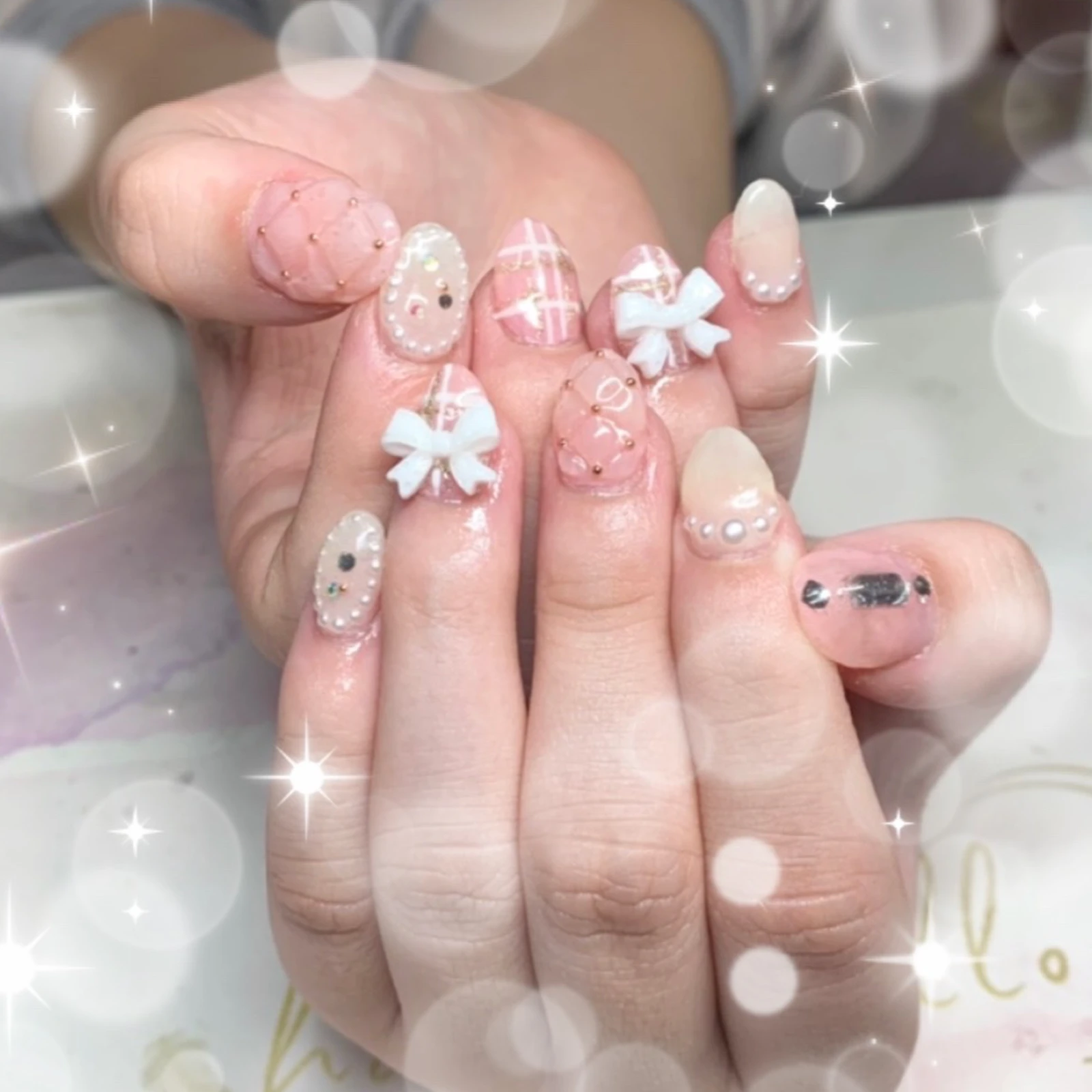 春ネイル リボン色白ネイル Xxmiyuxxが投稿したフォトブック Lemon8