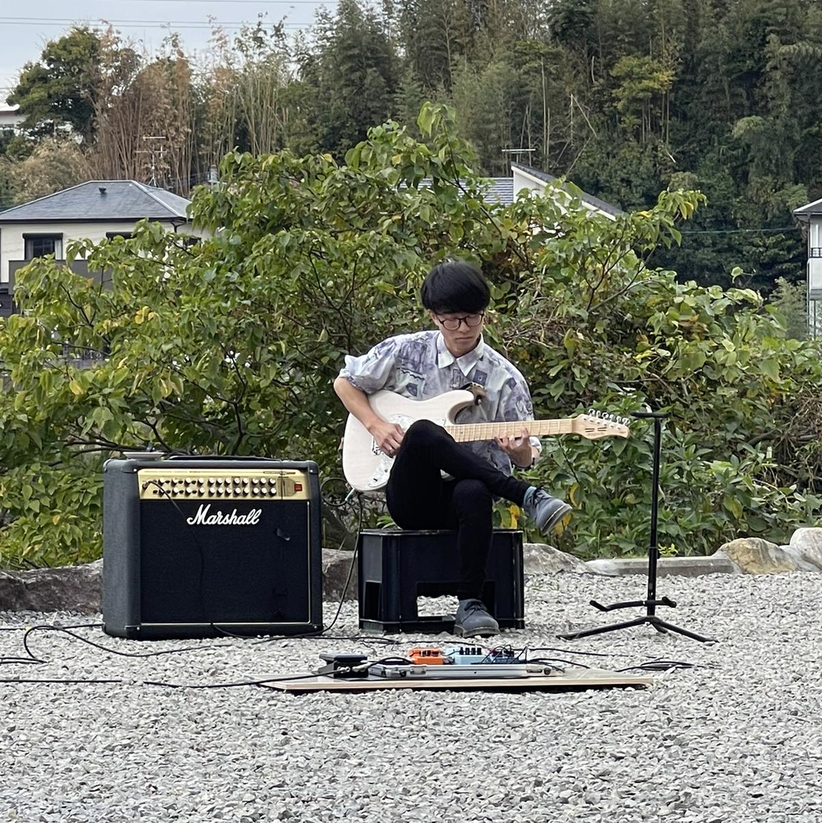 かいしん/ギター教える人の画像