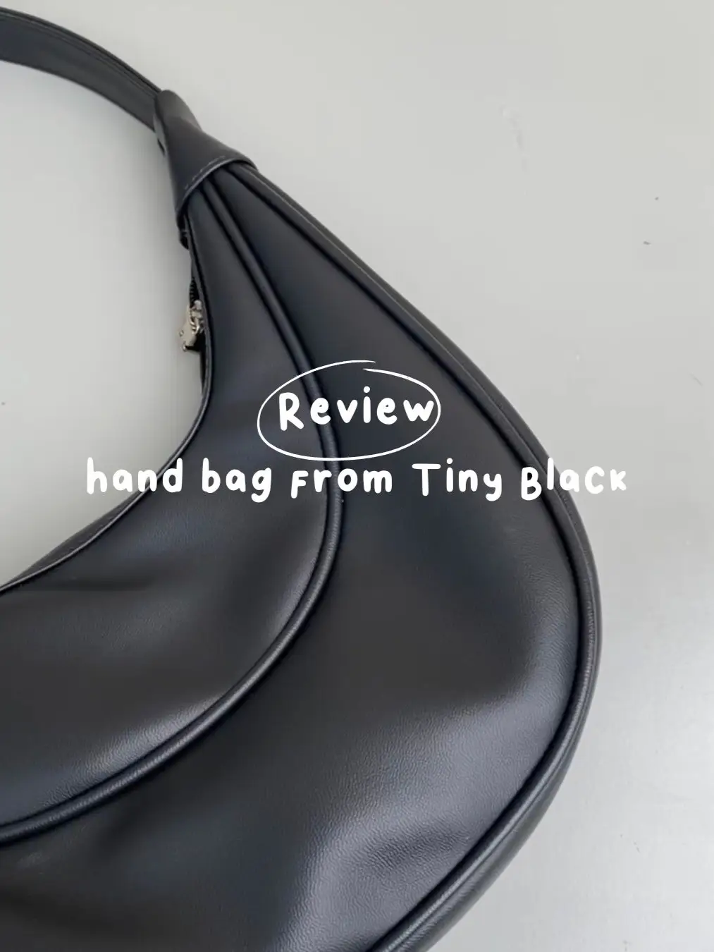 Tiny hot sale black bag