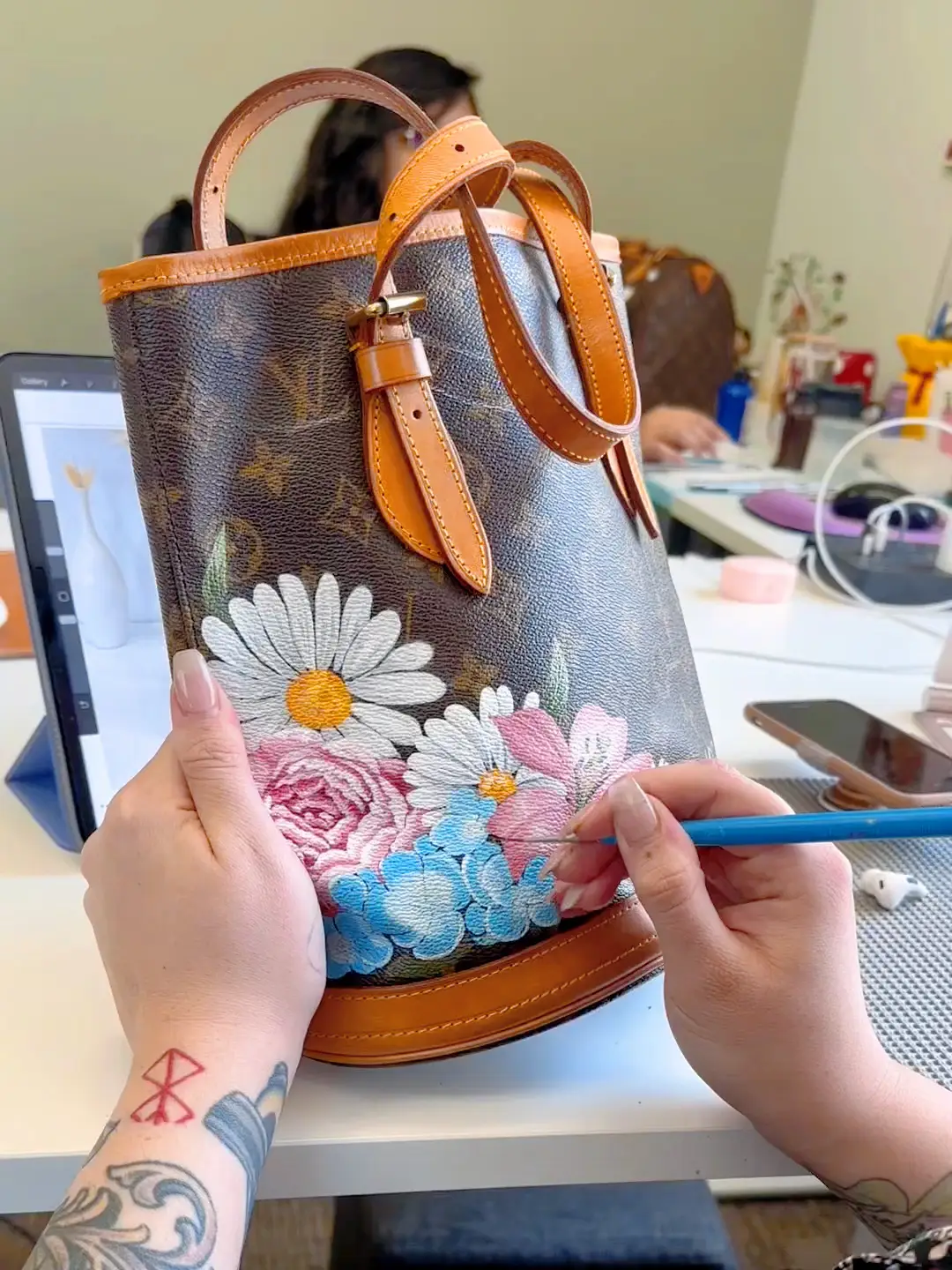 Louis Vuitton-inspired handbag, smaller than a grain of rice