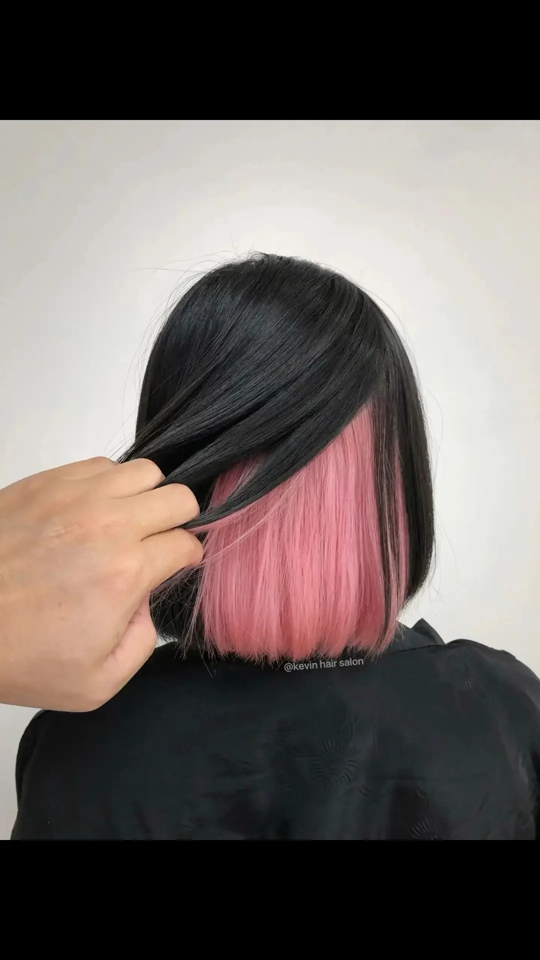 black hair pink underneath